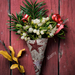closeup-of-a-bunch-of-mistletoe-wrapped-in-a-festive-fabric-on-a-