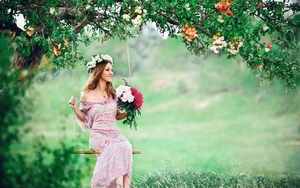 Beautiful-girl-swing-with-flowers-bouquet-wallpapers