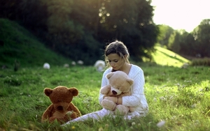 sad-girl-with-teddy-bears-wide