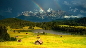rainbow-over-mountain-village-2400x1350-wallpaper