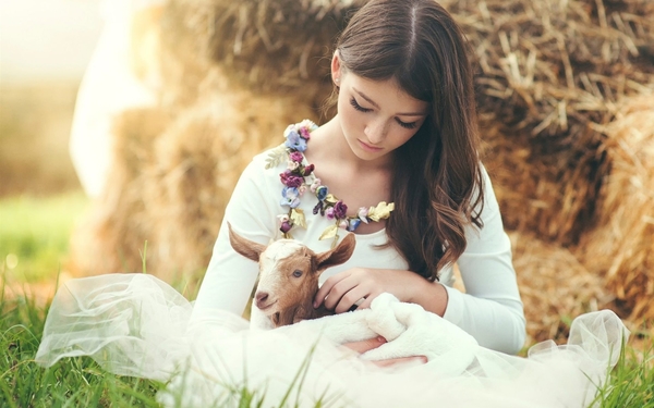 Beautiful-girl-with-little-goat-baby
