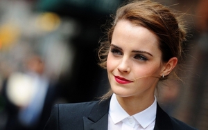 emma-watson-smiling-suit-red-lipstick-looking-away