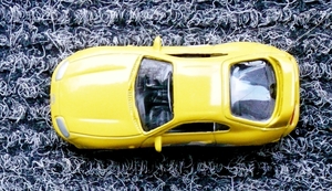 P1020935_Motormax_1op64_Toyota-Supra_1997_Yellow-silver-flag_No60