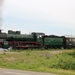 Gastlocomotief TSP 64.169, P8 (ex. CFR Roemenië) met trein nabij