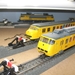85 drie gele treinen
